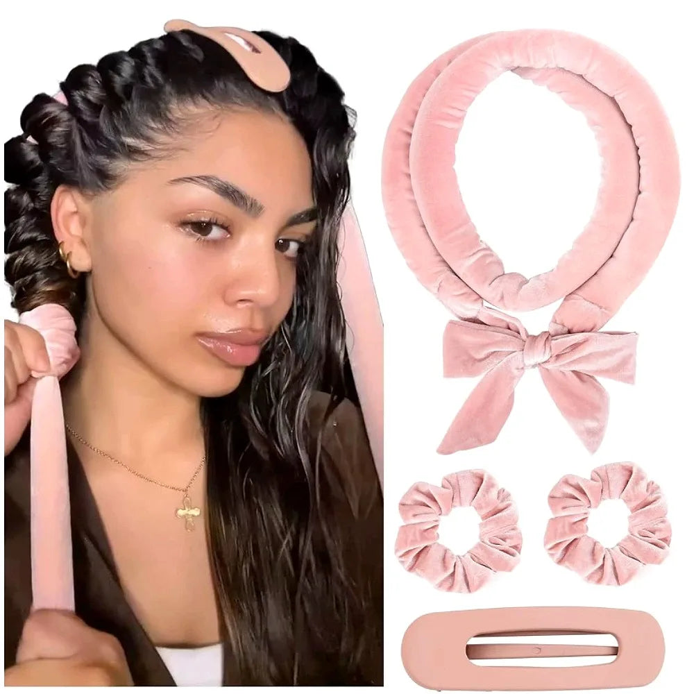 Woman with braided hair using a pink hair accessory, surrounded by pink hair accessories including scrunchies and a bow.