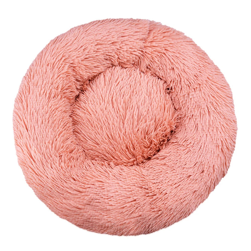 Pink skein of yarn on a white background